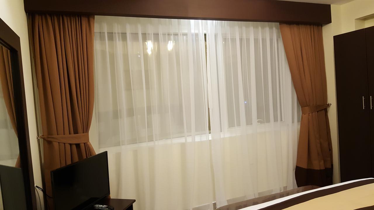 Travellers Hotel Apartment Дубай Экстерьер фото