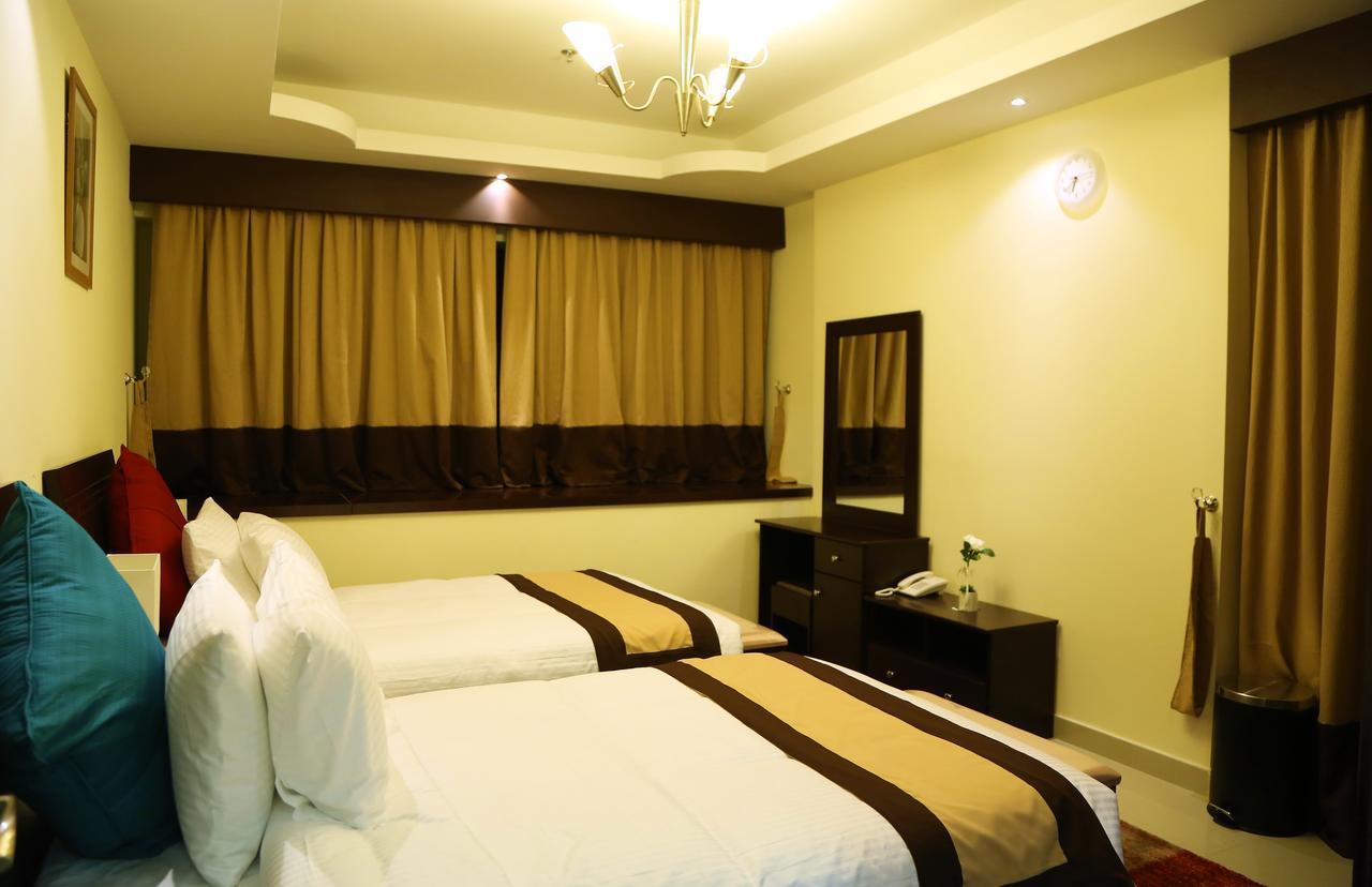 Travellers Hotel Apartment Дубай Экстерьер фото